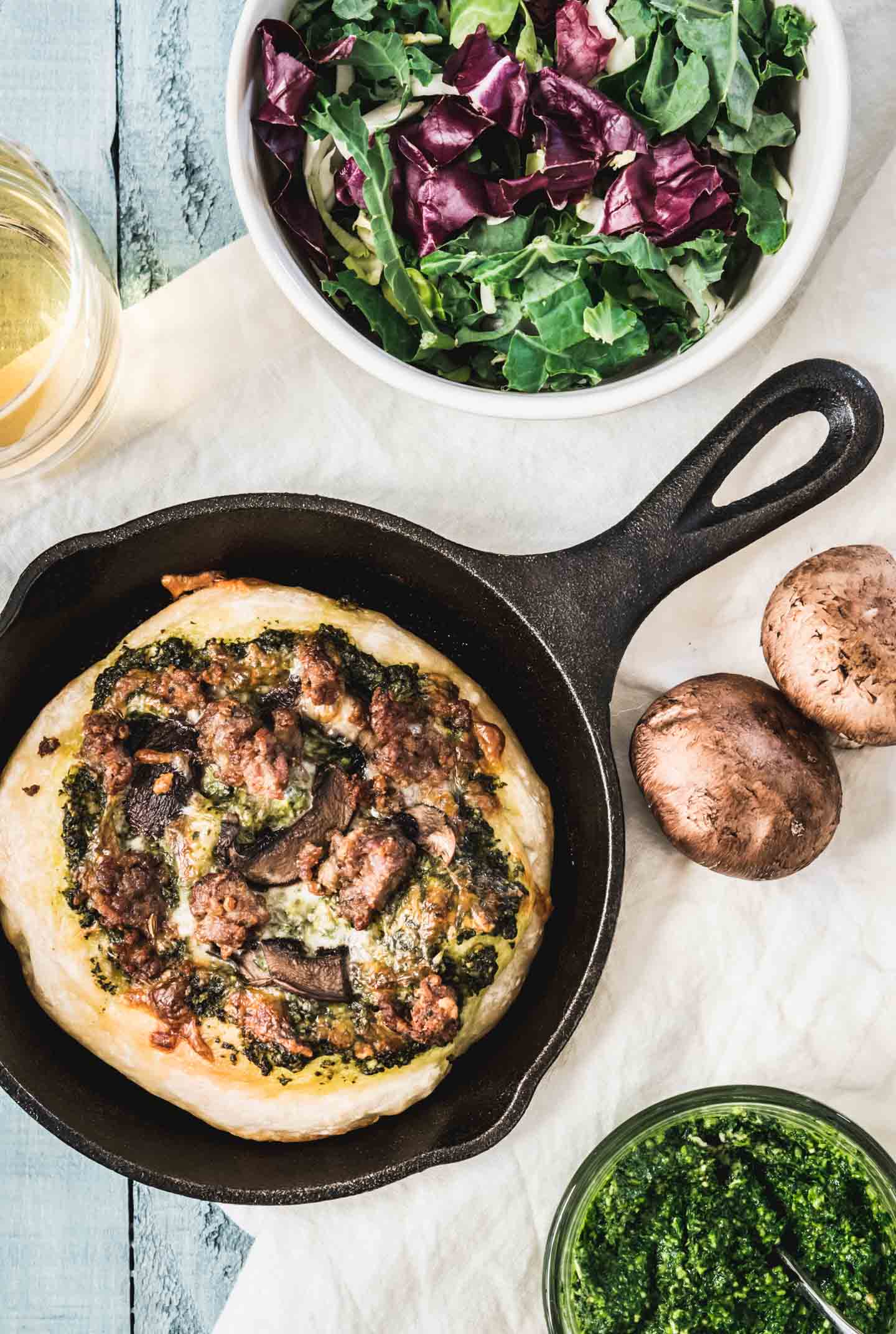 Mini Skillet Kale Pesto & Italian Sausage Pizzas