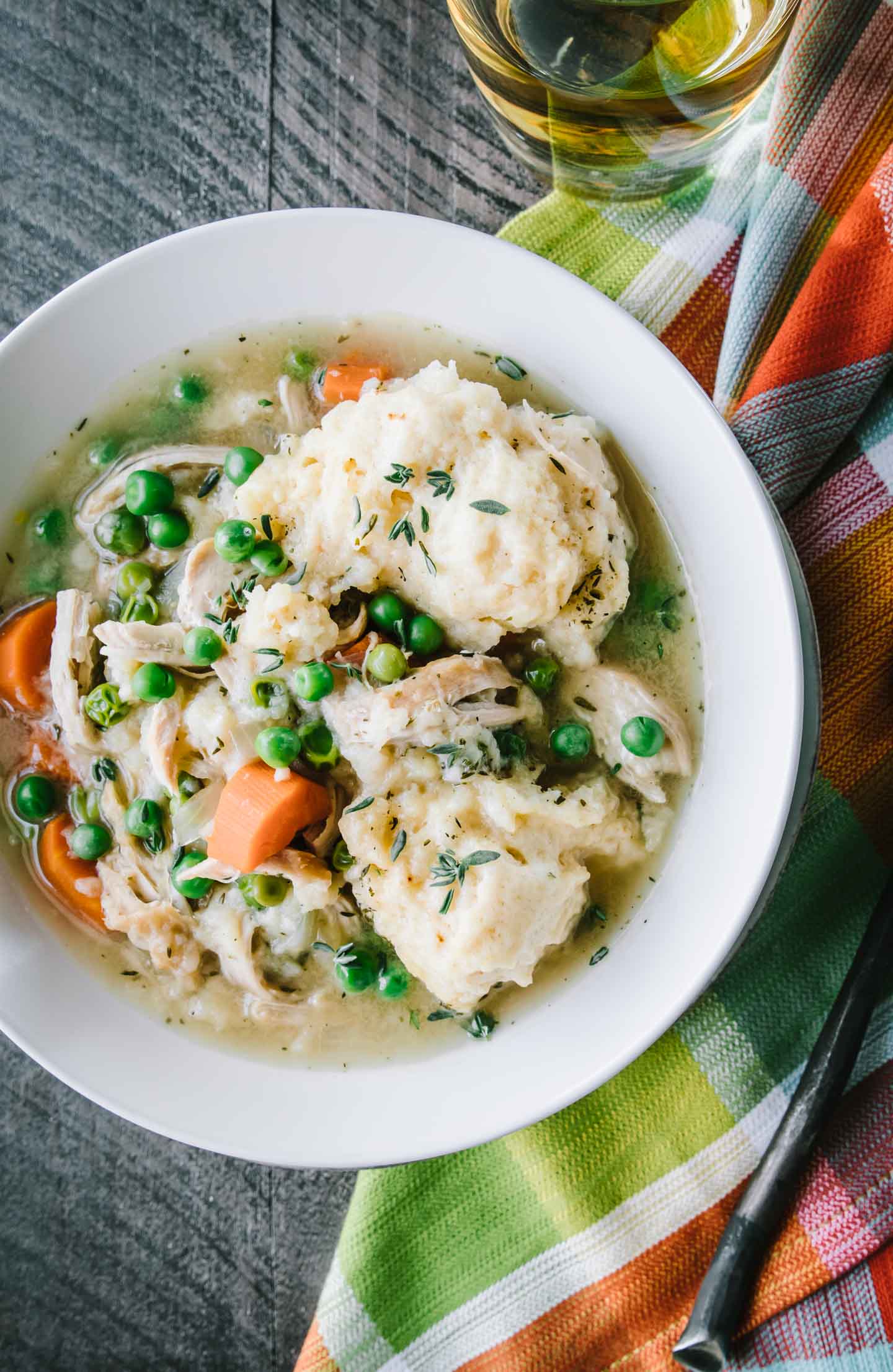 Chicken & Dumplings in a cream bowl photographed from overhead