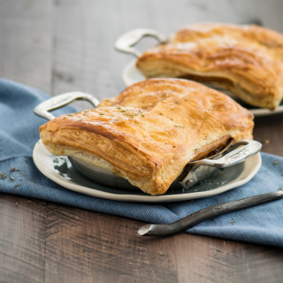 Beef & Stout Pot Pies with puff pastry crust in mini gratin pans