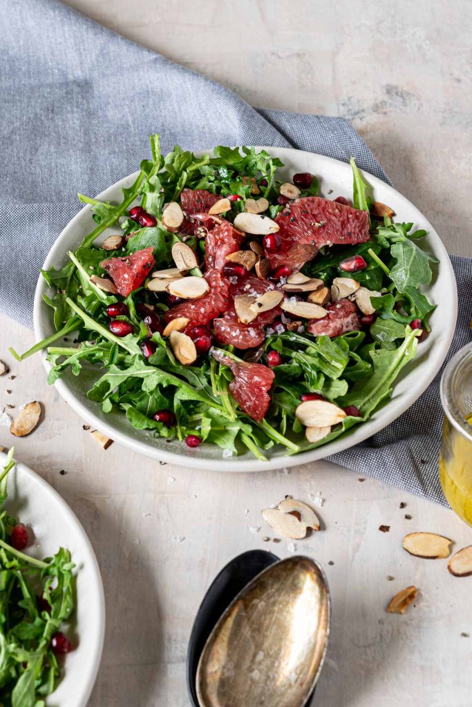 Grapefruit and pomegranate salad on a bed of arugula