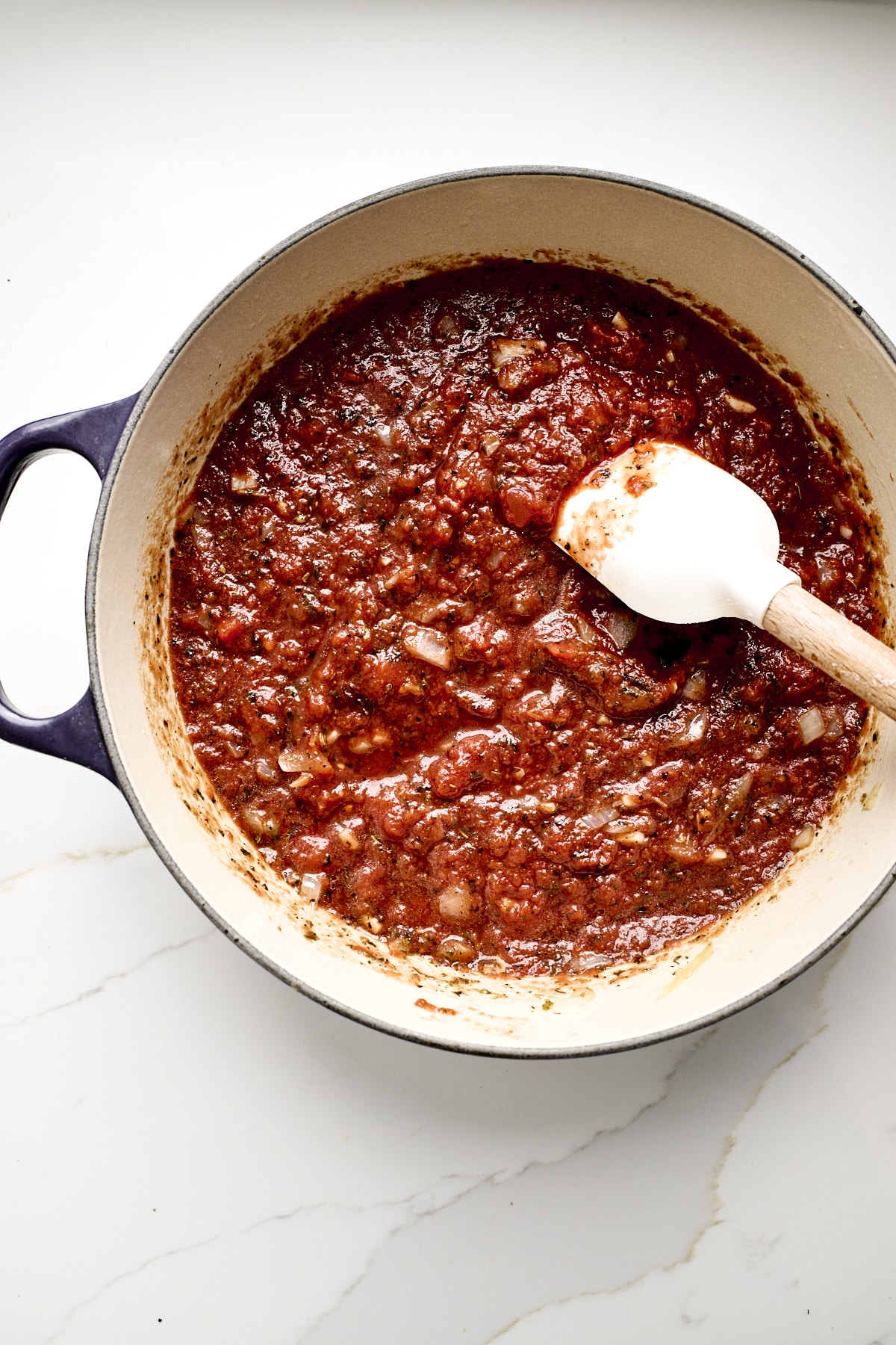 Tomato sauce for pasta cooking on a pot