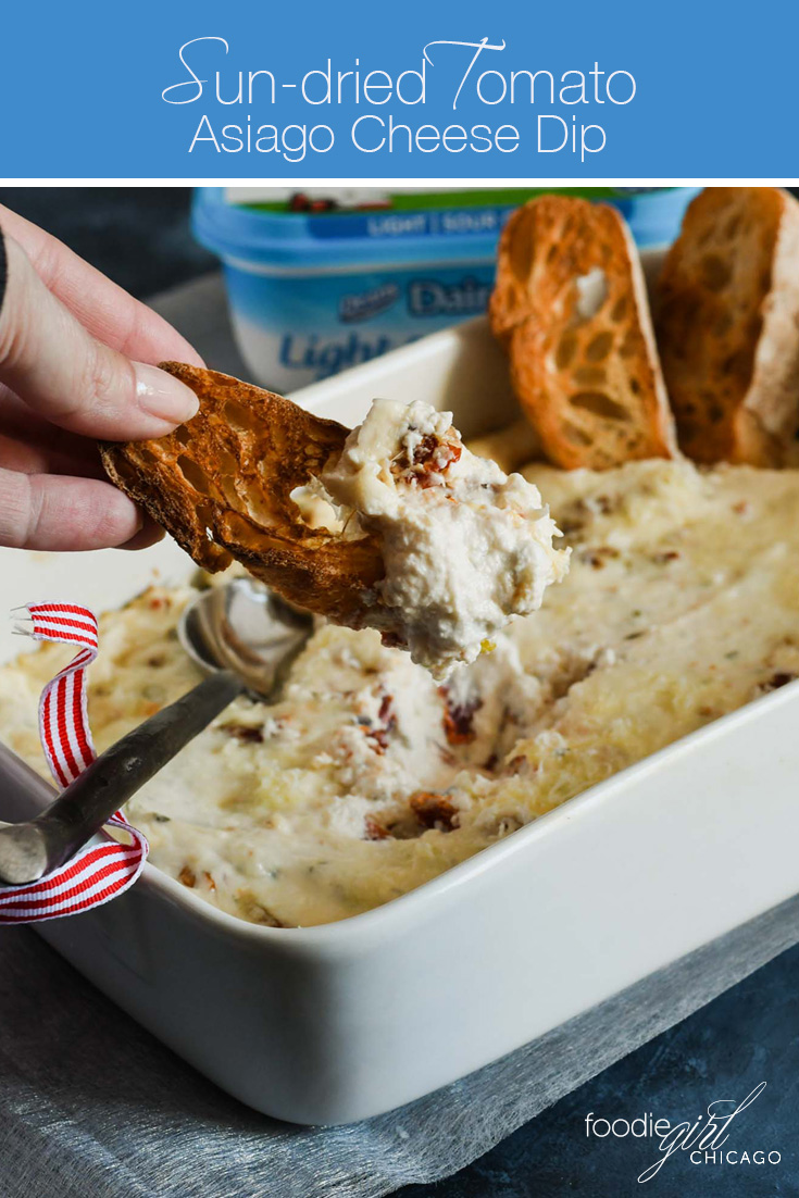 This creamy sun-dried tomato asiago cheese dip has only 5 ingredients and is the perfect solution for a quick holiday party appetizer when entertaining friends and family! 