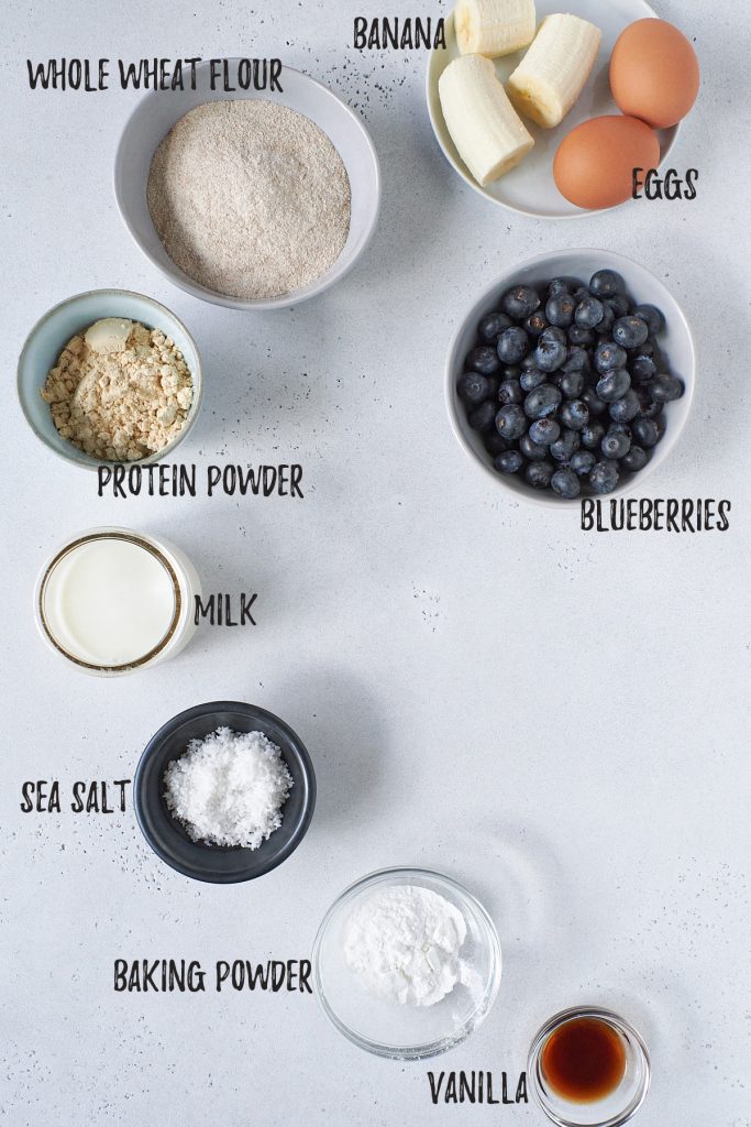 Protein pancake ingredients | blueberries, banana, flour, protein powder, milk, vanilla