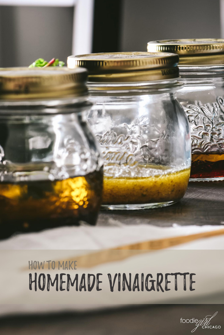 Three mason jars filled with homemade vinaigrette