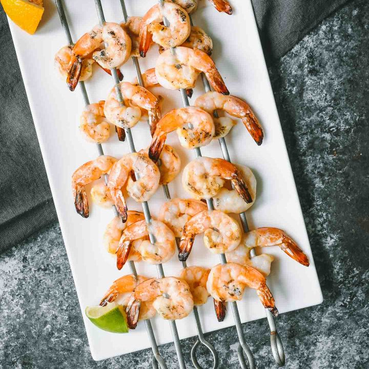 Grilled shrimp on metal skewers