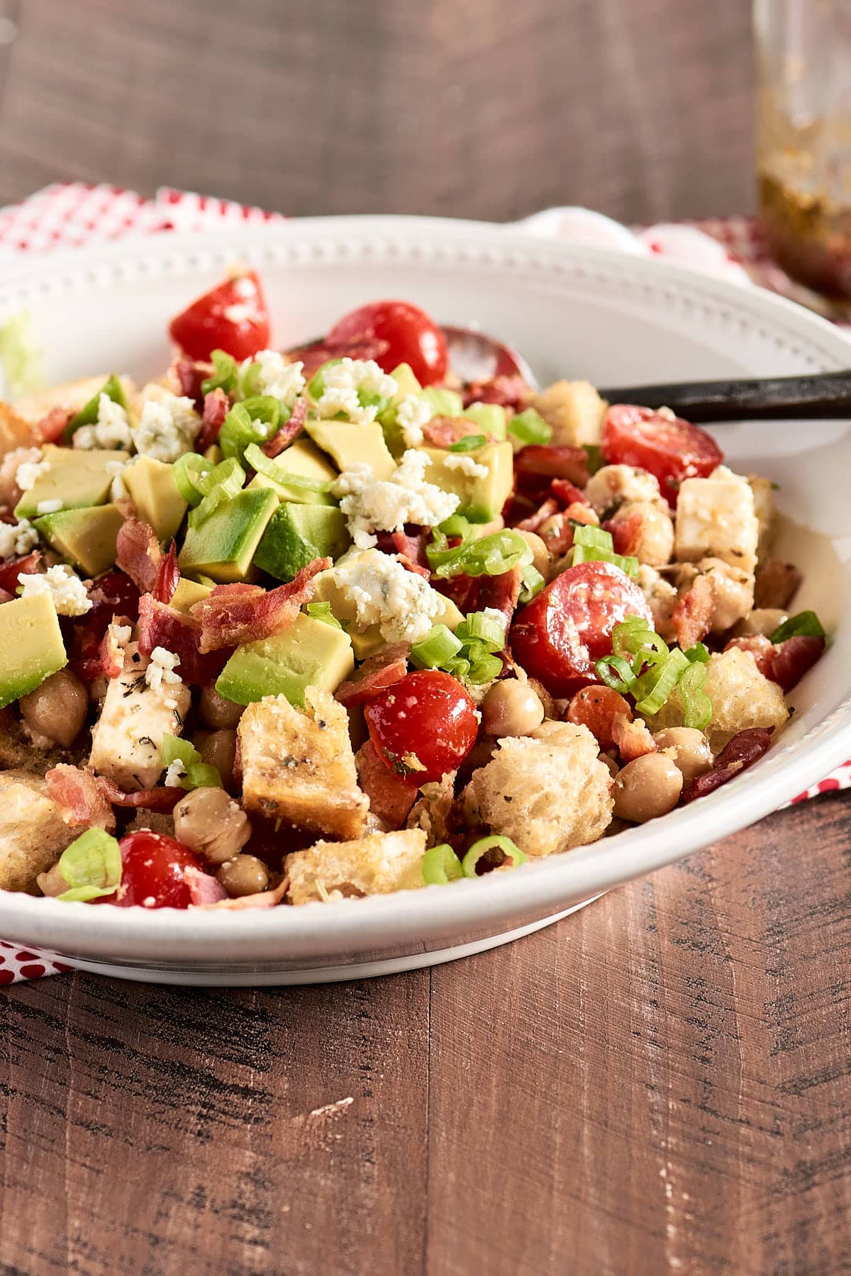 Panzanella salad in a low white bowl 
