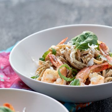 Two bowls of Shrimp Linguine with Lemon Artichoke Pesto