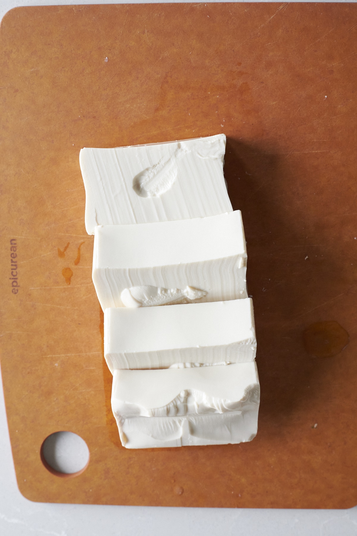 Slices of tofu on a cutting board