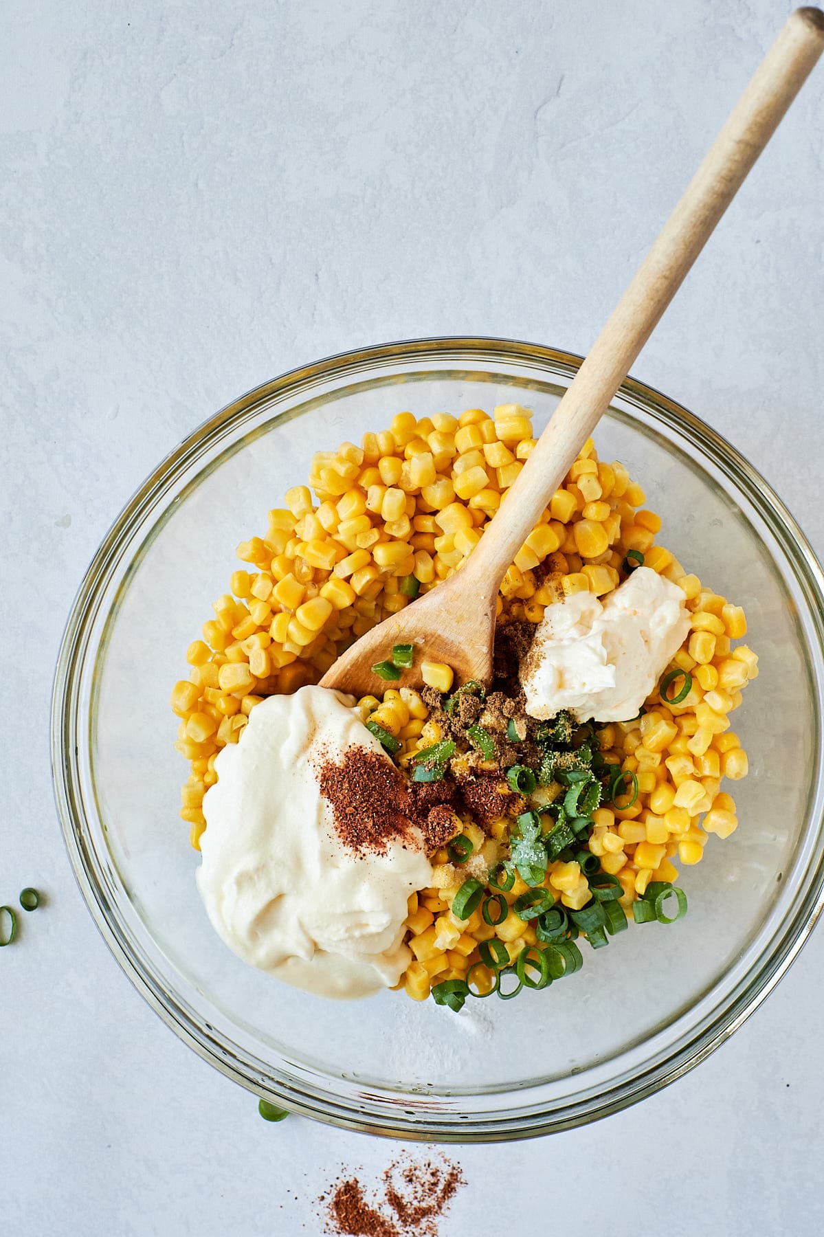 Ingredients for Street Corn Dip in a glass bowl