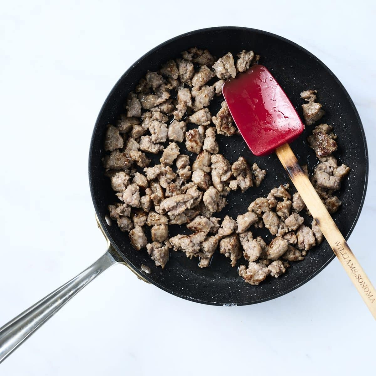 Browned breakfast sausage in a skillet