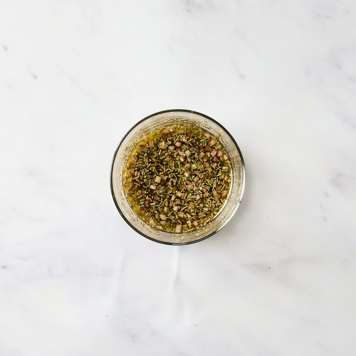 Panzanella salad dressing in a glass bowl