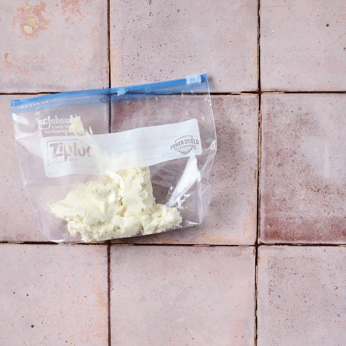 Zip top bag filled with no bake cheesecake mixture